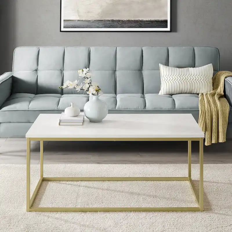 Table basse moderne à structure métallique avec plateau en faux marbre