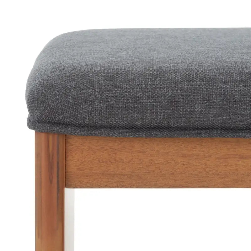 Banc rembourré avec étagère ouverte et pieds effilés