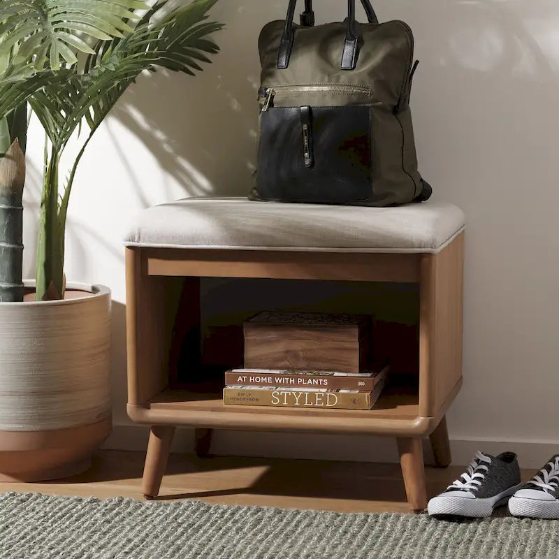 Banc rembourré avec étagère ouverte et pieds effilés