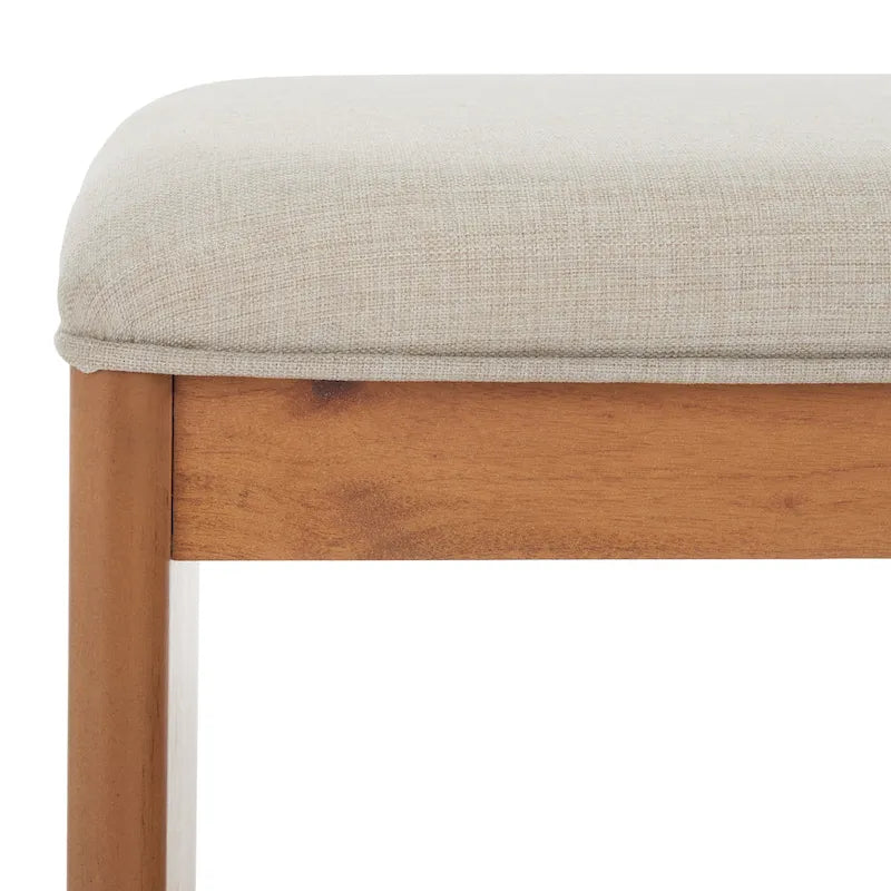 Banc rembourré avec étagère ouverte et pieds effilés
